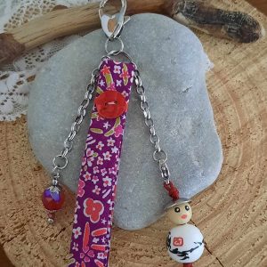 Bijou de sac en acier inoxydable et liberty, poupée rouge